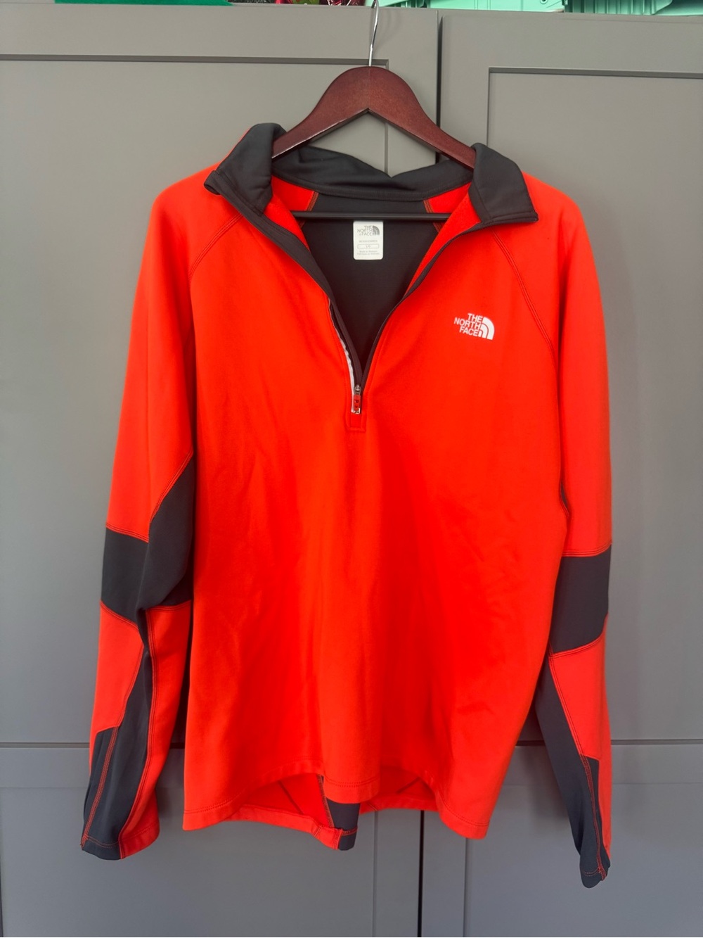 The North Face Men’s Orange Half-Zip Performance Jacket with Gray Panels